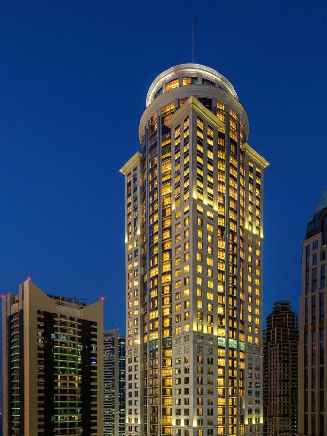 Dusit Hotel&Suites - Dauhá Exteriér fotografie The hotel at night