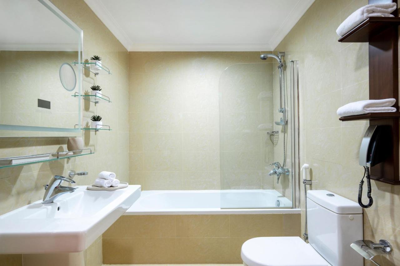 Dusit Hotel&Suites - Dauhá Exteriér fotografie A modern bathroom